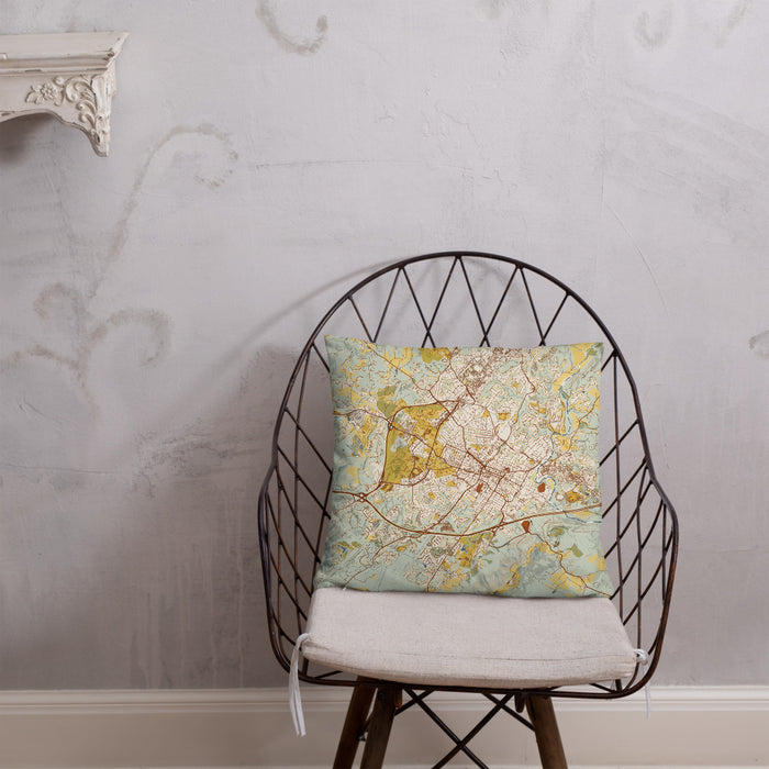 Custom Charlottesville Virginia Map Throw Pillow in Woodblock on Cream Colored Couch