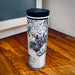 17oz Stainless Steel Insulated Tumbler in Hand with Black Tactile Lines Map