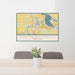 24x36 Chippewa Falls Wisconsin Map Print Lanscape Orientation in Woodblock Style Behind 2 Chairs Table and Potted Plant