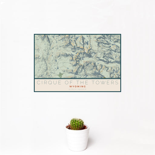12x18 Cirque of the Towers Wyoming Map Print Landscape Orientation in Woodblock Style With Small Cactus Plant in White Planter
