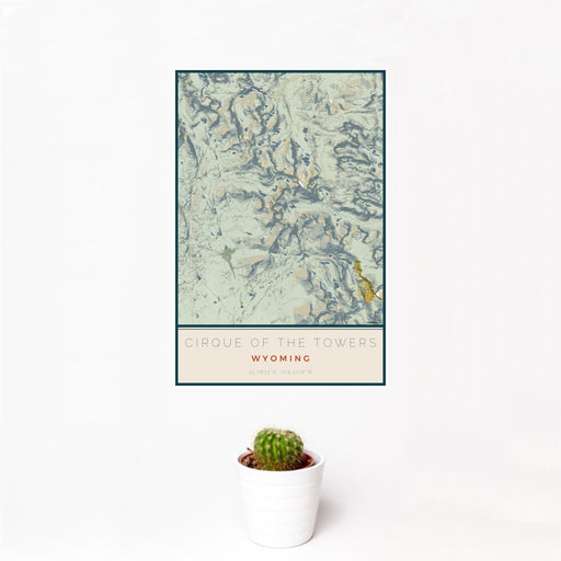 12x18 Cirque of the Towers Wyoming Map Print Portrait Orientation in Woodblock Style With Small Cactus Plant in White Planter