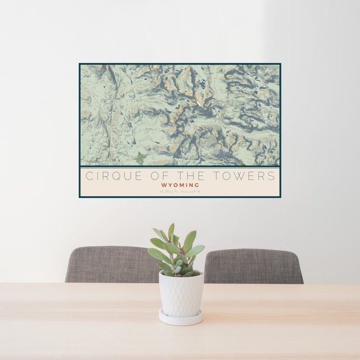 24x36 Cirque of the Towers Wyoming Map Print Lanscape Orientation in Woodblock Style Behind 2 Chairs Table and Potted Plant