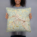 Person holding 18x18 Custom Clarksburg West Virginia Map Throw Pillow in Woodblock