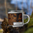 Right View Custom Clinton North Carolina Map Enamel Mug in Ember on Grass With Trees in Background