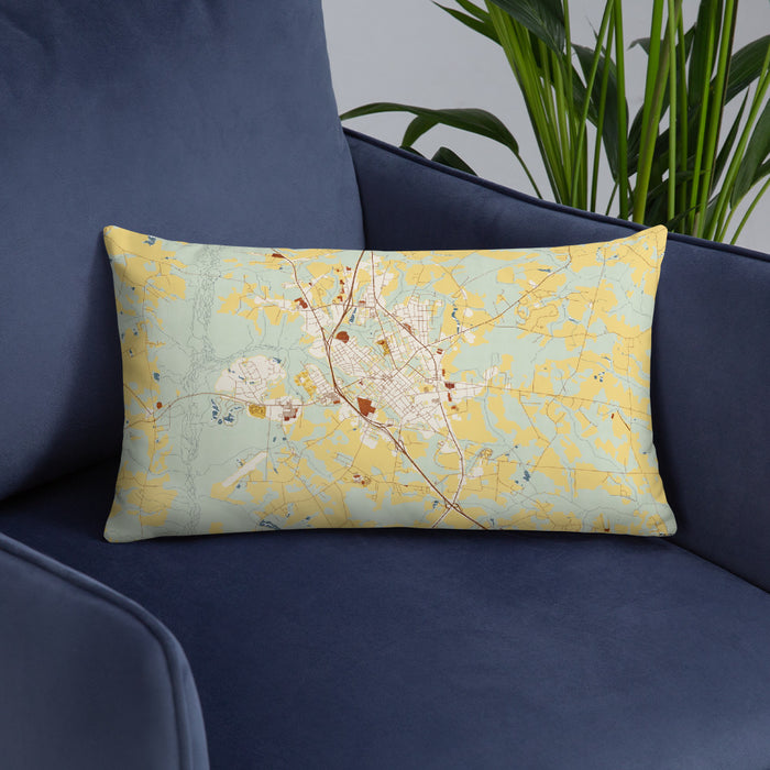 Custom Clinton North Carolina Map Throw Pillow in Woodblock on Blue Colored Chair
