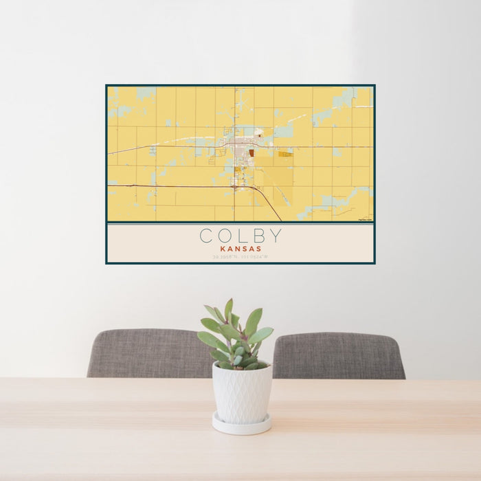 24x36 Colby Kansas Map Print Lanscape Orientation in Woodblock Style Behind 2 Chairs Table and Potted Plant