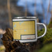 Right View Custom Colby Kansas Map Enamel Mug in Woodblock on Grass With Trees in Background