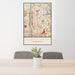 24x36 Columbia Heights Minnesota Map Print Portrait Orientation in Woodblock Style Behind 2 Chairs Table and Potted Plant