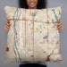 Person holding 22x22 Custom Columbia Heights Minnesota Map Throw Pillow in Woodblock