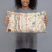 Person holding 20x12 Custom Columbia Heights Minnesota Map Throw Pillow in Woodblock