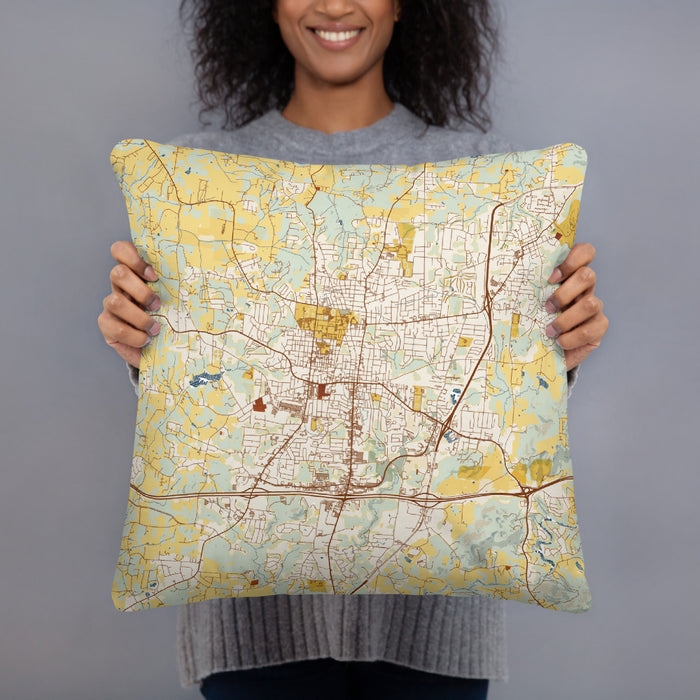 Person holding 18x18 Custom Cookeville Tennessee Map Throw Pillow in Woodblock