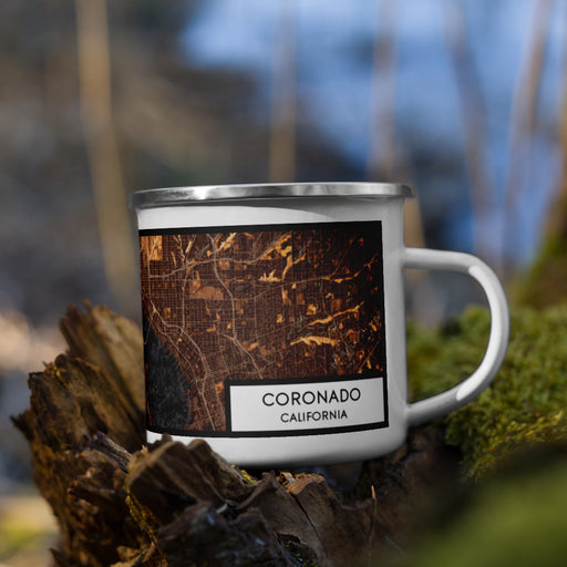 Right View Custom Coronado California Map Enamel Mug in Ember on Grass With Trees in Background