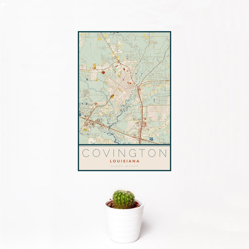 12x18 Covington Louisiana Map Print Portrait Orientation in Woodblock Style With Small Cactus Plant in White Planter