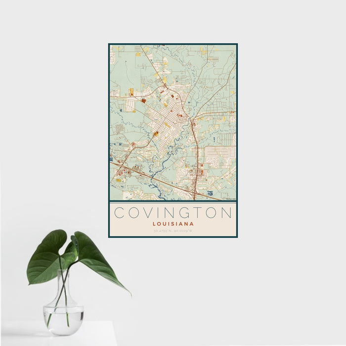 16x24 Covington Louisiana Map Print Portrait Orientation in Woodblock Style With Tropical Plant Leaves in Water