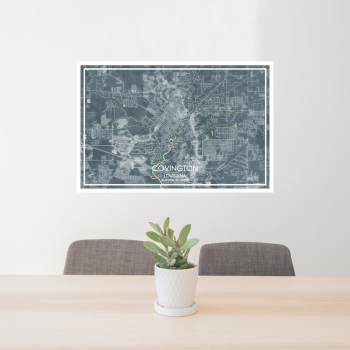 24x36 Covington Louisiana Map Print Lanscape Orientation in Afternoon Style Behind 2 Chairs Table and Potted Plant