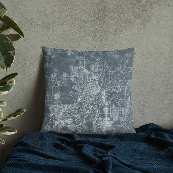 Custom Covington Louisiana Map Throw Pillow in Afternoon on Bedding Against Wall