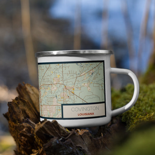 Right View Custom Covington Louisiana Map Enamel Mug in Woodblock on Grass With Trees in Background