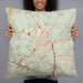 Person holding 22x22 Custom Covington Louisiana Map Throw Pillow in Woodblock