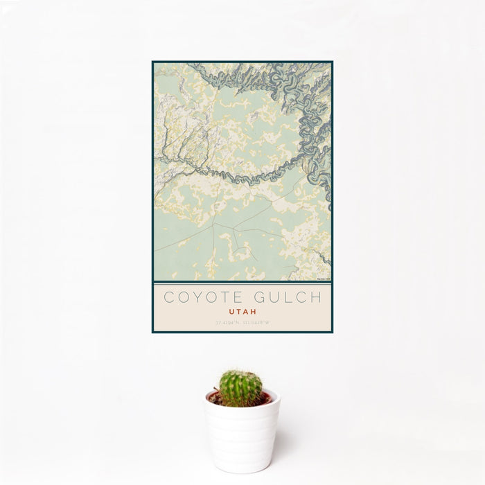 12x18 Coyote Gulch Utah Map Print Portrait Orientation in Woodblock Style With Small Cactus Plant in White Planter
