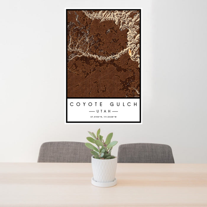 24x36 Coyote Gulch Utah Map Print Portrait Orientation in Ember Style Behind 2 Chairs Table and Potted Plant