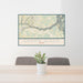 24x36 Coyote Gulch Utah Map Print Landscape Orientation in Woodblock Style Behind 2 Chairs Table and Potted Plant