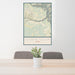 24x36 Coyote Gulch Utah Map Print Portrait Orientation in Woodblock Style Behind 2 Chairs Table and Potted Plant
