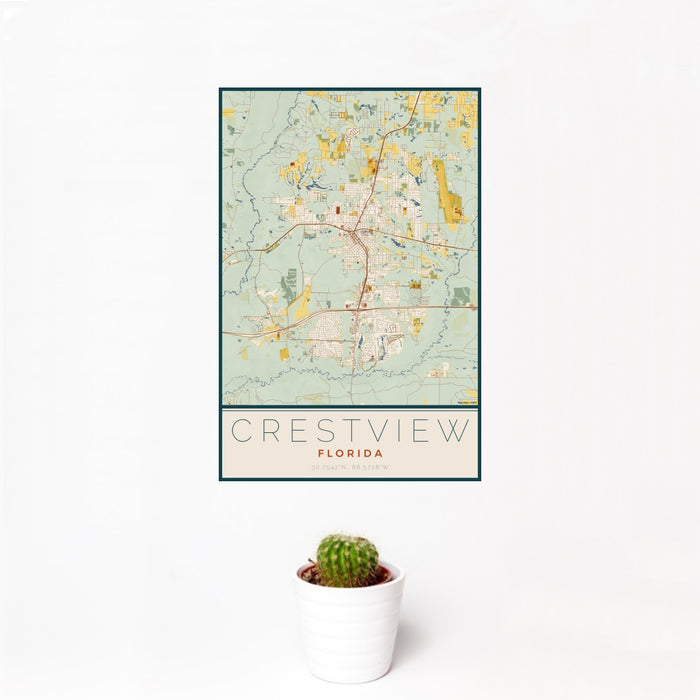 12x18 Crestview Florida Map Print Portrait Orientation in Woodblock Style With Small Cactus Plant in White Planter