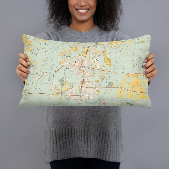 Person holding 20x12 Custom Crestview Florida Map Throw Pillow in Woodblock