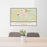 24x36 Crossville Tennessee Map Print Lanscape Orientation in Woodblock Style Behind 2 Chairs Table and Potted Plant