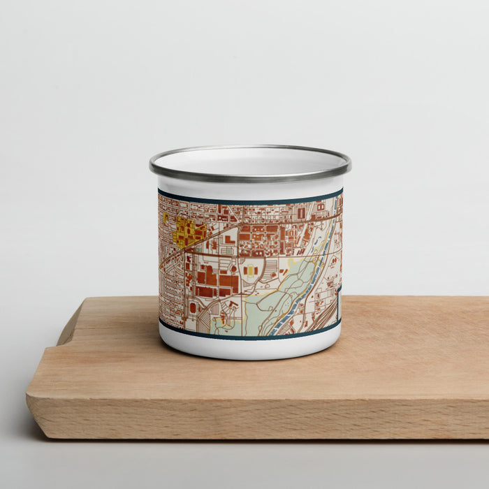 Front View Custom Cultural District Fort Worth Map Enamel Mug in Woodblock on Cutting Board