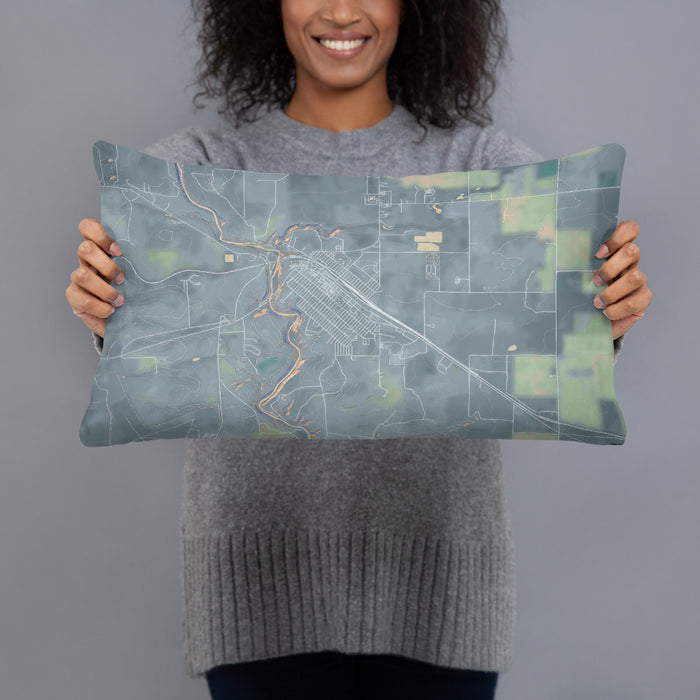 Person holding 20x12 Custom Cut Bank Montana Map Throw Pillow in Afternoon
