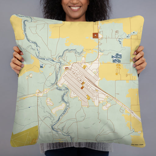 Person holding 22x22 Custom Cut Bank Montana Map Throw Pillow in Woodblock