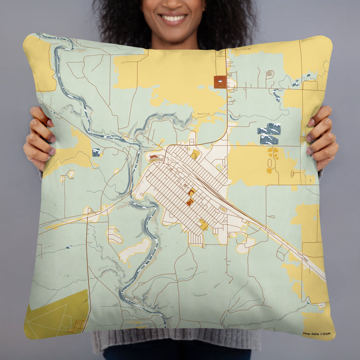 Person holding 22x22 Custom Cut Bank Montana Map Throw Pillow in Woodblock