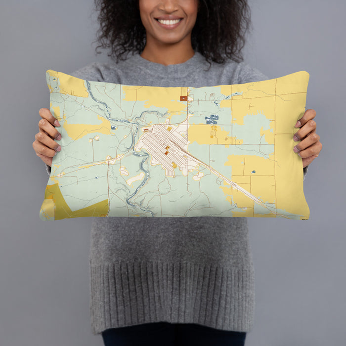 Person holding 20x12 Custom Cut Bank Montana Map Throw Pillow in Woodblock