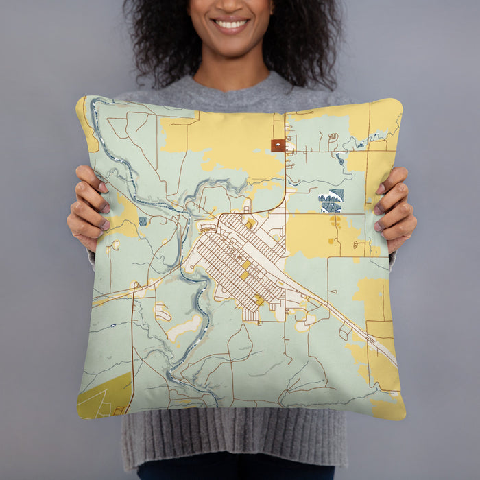 Person holding 18x18 Custom Cut Bank Montana Map Throw Pillow in Woodblock
