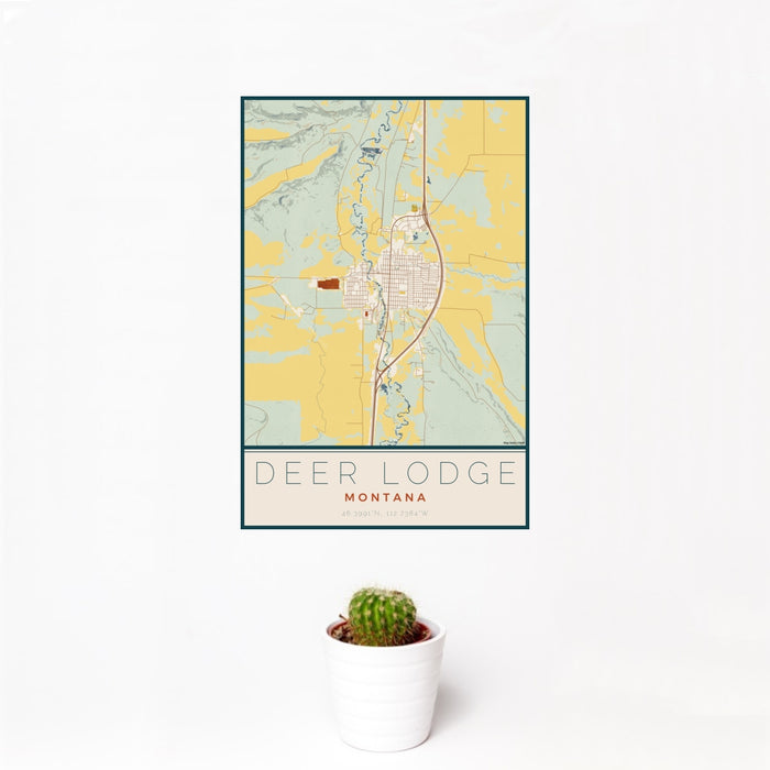 12x18 Deer Lodge Montana Map Print Portrait Orientation in Woodblock Style With Small Cactus Plant in White Planter