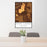 24x36 Deer Lodge Montana Map Print Portrait Orientation in Ember Style Behind 2 Chairs Table and Potted Plant