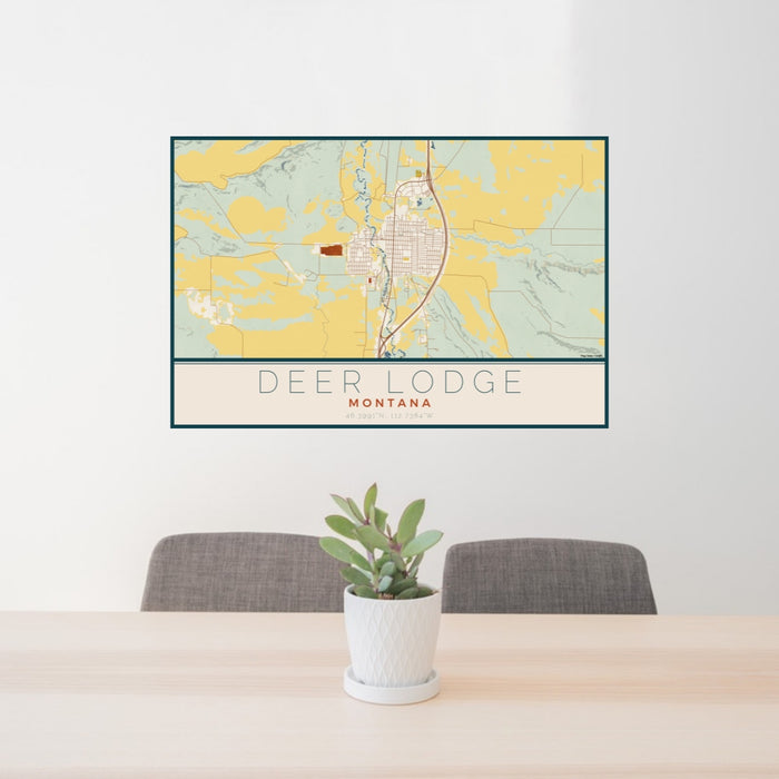 24x36 Deer Lodge Montana Map Print Lanscape Orientation in Woodblock Style Behind 2 Chairs Table and Potted Plant