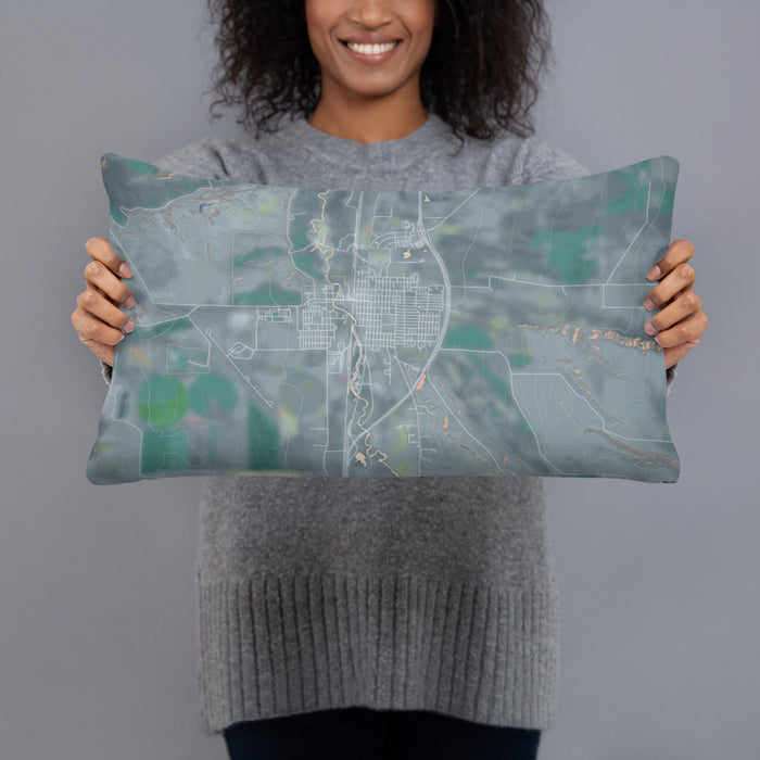 Person holding 20x12 Custom Deer Lodge Montana Map Throw Pillow in Afternoon