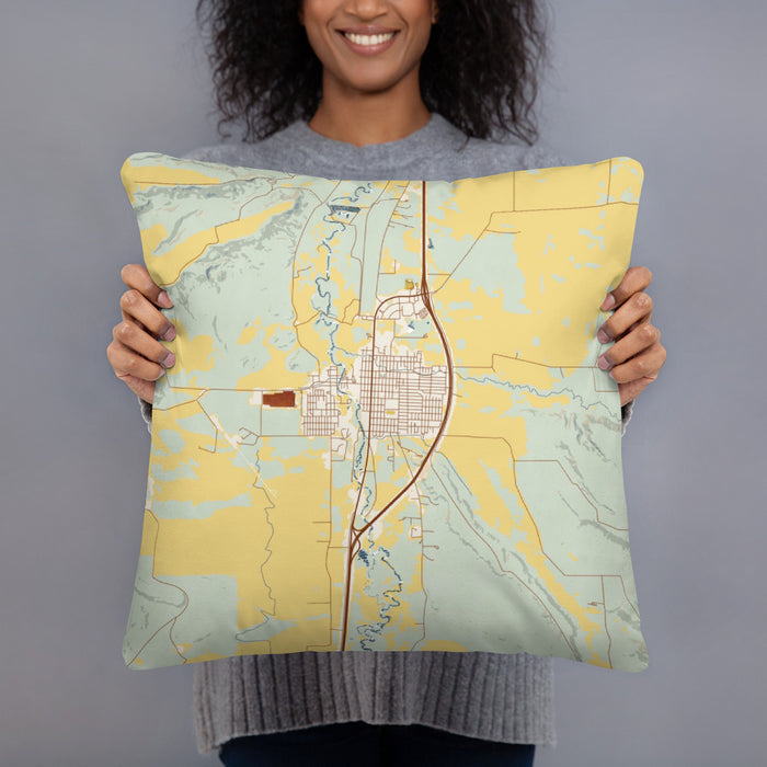 Person holding 18x18 Custom Deer Lodge Montana Map Throw Pillow in Woodblock