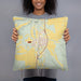 Person holding 18x18 Custom Deer Lodge Montana Map Throw Pillow in Woodblock