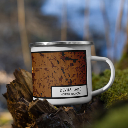 Right View Custom Devils Lake North Dakota Map Enamel Mug in Ember on Grass With Trees in Background