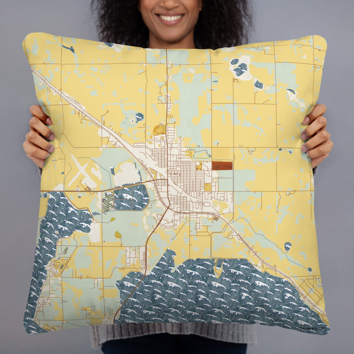 Person holding 22x22 Custom Devils Lake North Dakota Map Throw Pillow in Woodblock