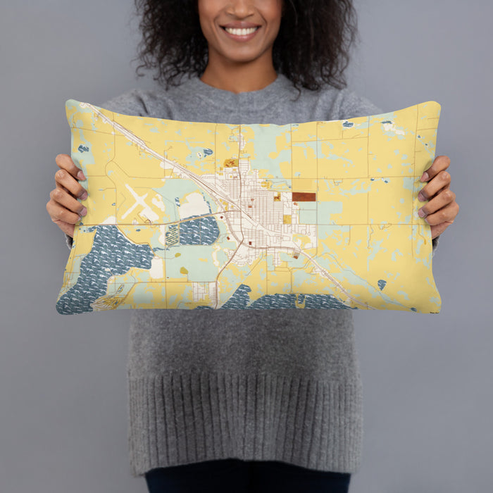 Person holding 20x12 Custom Devils Lake North Dakota Map Throw Pillow in Woodblock