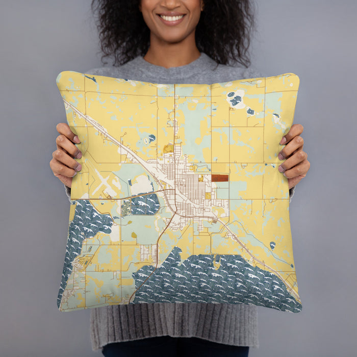 Person holding 18x18 Custom Devils Lake North Dakota Map Throw Pillow in Woodblock