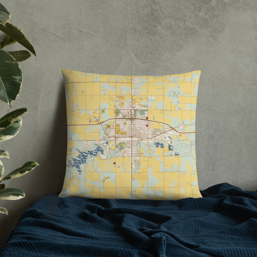 Custom Dickinson North Dakota Map Throw Pillow in Woodblock on Bedding Against Wall