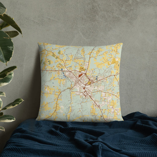 Custom Dickson Tennessee Map Throw Pillow in Woodblock on Bedding Against Wall