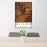 24x36 Dillon Montana Map Print Portrait Orientation in Ember Style Behind 2 Chairs Table and Potted Plant