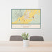 24x36 Dillon Montana Map Print Lanscape Orientation in Woodblock Style Behind 2 Chairs Table and Potted Plant