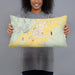 Person holding 20x12 Custom Dillon Montana Map Throw Pillow in Woodblock